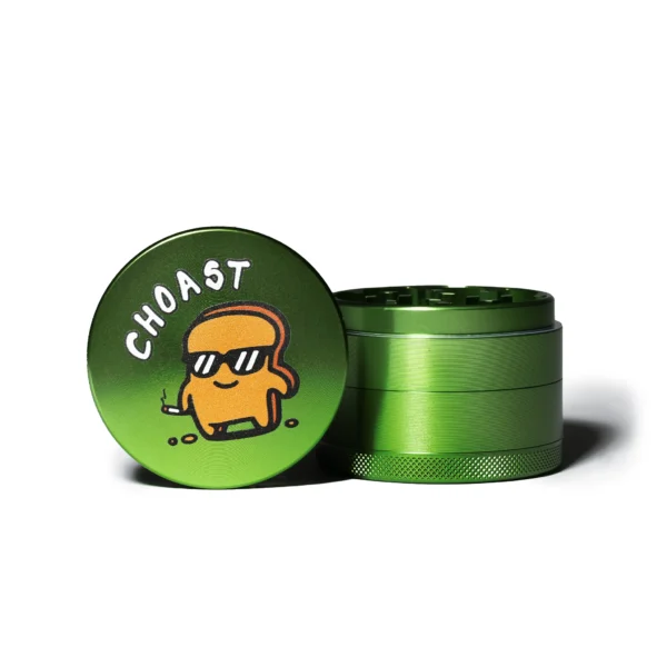 Our Green Choast 4 piece grinder. Showcasing the top piece of the grinder with the choast logo on it, and the rest of the grinder put together sitting beside it